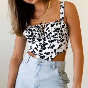 Haut type corset blanc et noir avec nœud à l&rsquo;avant